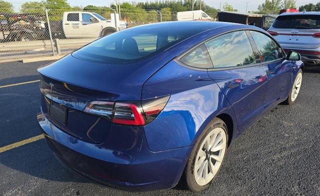 used 2022 Tesla Model 3 car, priced at $21,000