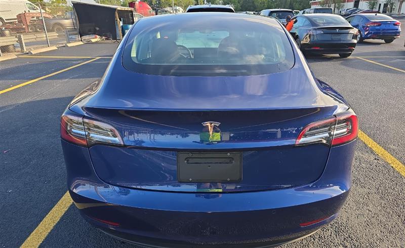 used 2022 Tesla Model 3 car, priced at $21,000