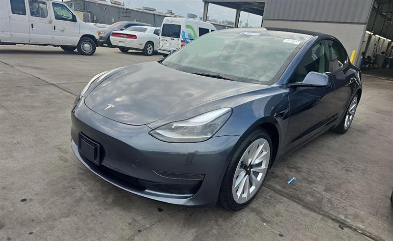 used 2023 Tesla Model 3 car, priced at $21,999