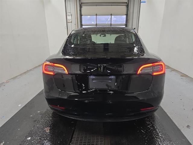 used 2023 Tesla Model 3 car, priced at $22,000