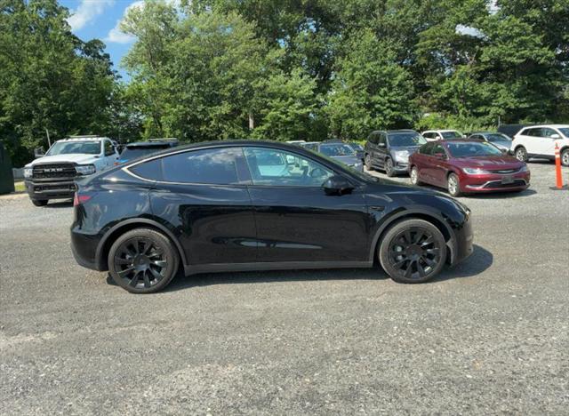used 2023 Tesla Model Y car, priced at $26,500