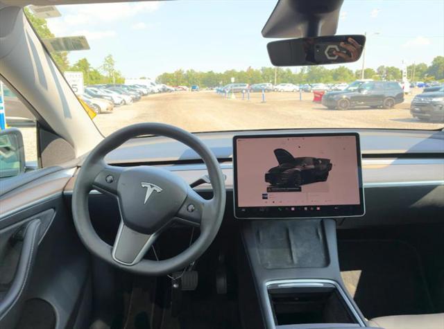 used 2023 Tesla Model Y car, priced at $26,500