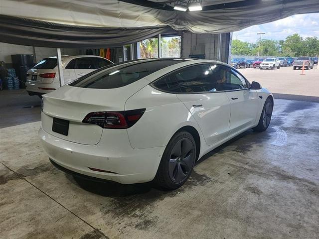 used 2019 Tesla Model 3 car, priced at $15,000