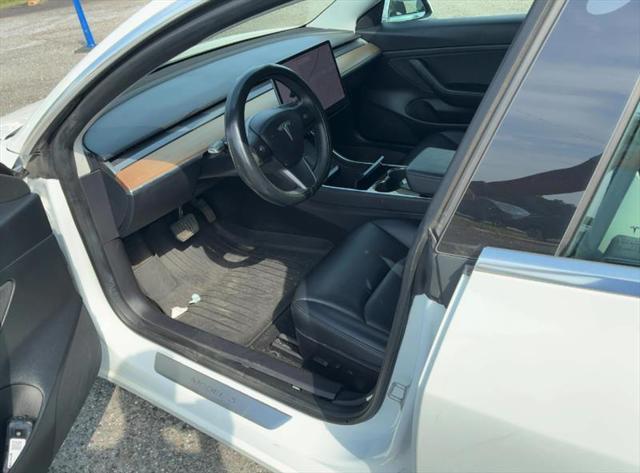used 2020 Tesla Model 3 car, priced at $15,500