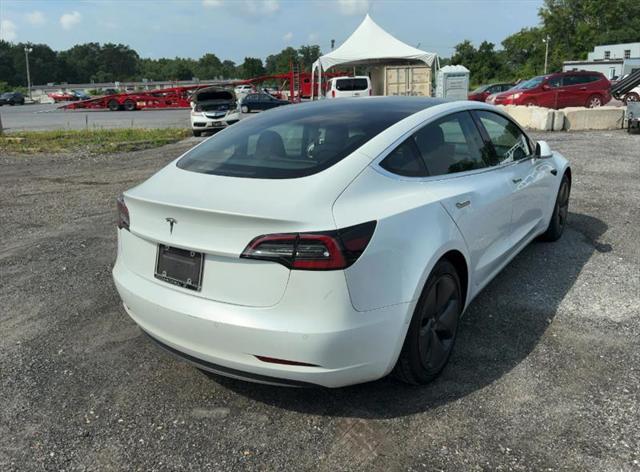 used 2020 Tesla Model 3 car, priced at $15,500