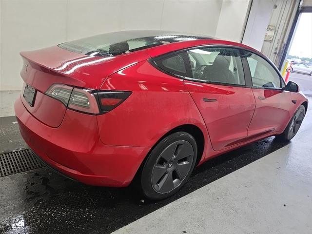 used 2023 Tesla Model 3 car, priced at $21,750