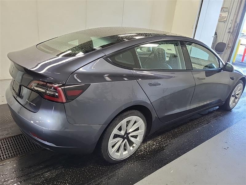 used 2022 Tesla Model 3 car, priced at $22,500
