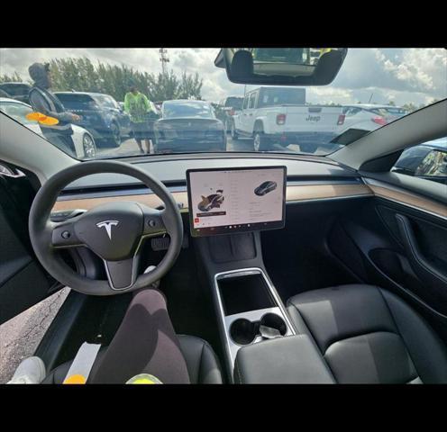 used 2023 Tesla Model 3 car, priced at $31,000