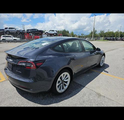 used 2023 Tesla Model 3 car, priced at $31,000