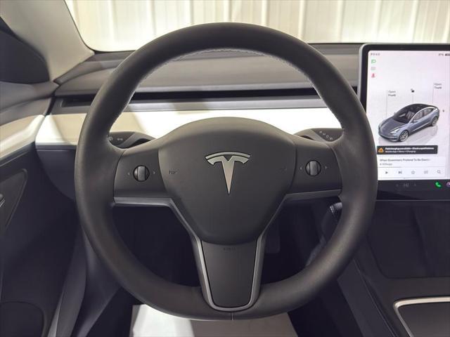 used 2022 Tesla Model 3 car, priced at $27,000