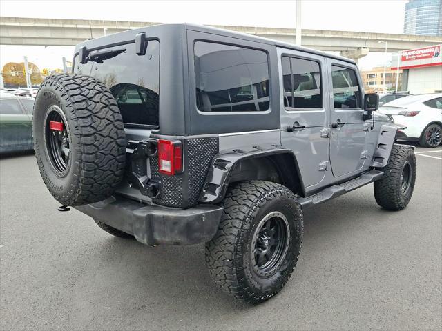 used 2014 Jeep Wrangler Unlimited car, priced at $16,692