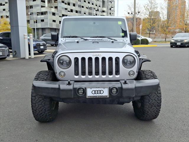 used 2014 Jeep Wrangler Unlimited car, priced at $16,692