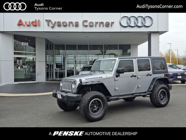 used 2014 Jeep Wrangler Unlimited car, priced at $13,994