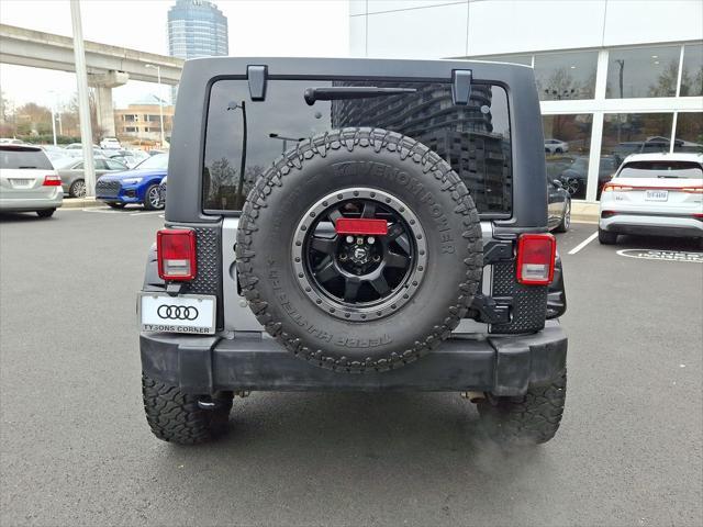 used 2014 Jeep Wrangler Unlimited car, priced at $16,692