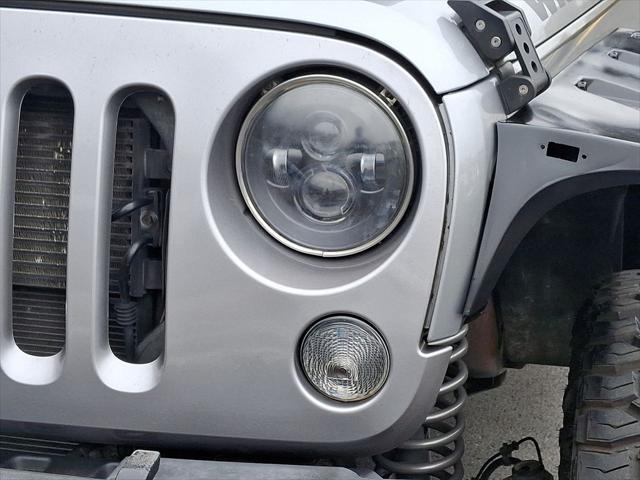 used 2014 Jeep Wrangler Unlimited car, priced at $16,692