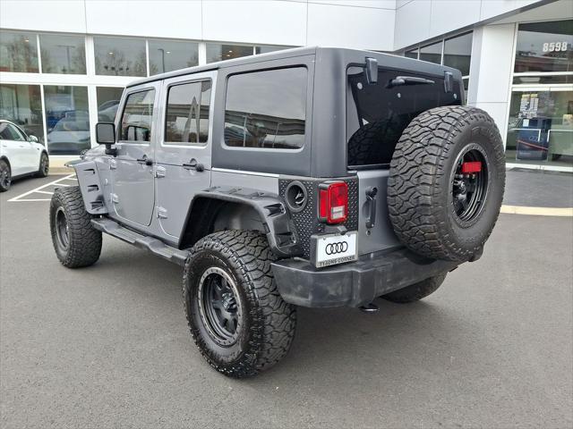 used 2014 Jeep Wrangler Unlimited car, priced at $16,692