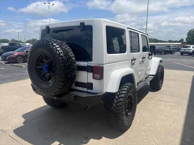 used 2013 Jeep Wrangler Unlimited car, priced at $17,487