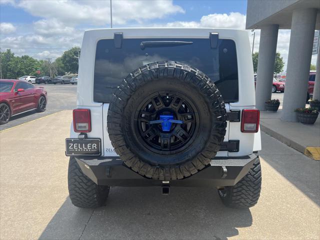 used 2013 Jeep Wrangler Unlimited car, priced at $17,487
