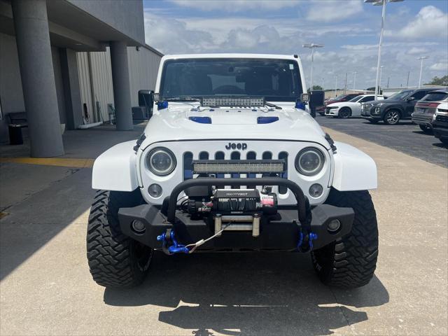 used 2013 Jeep Wrangler Unlimited car, priced at $17,487