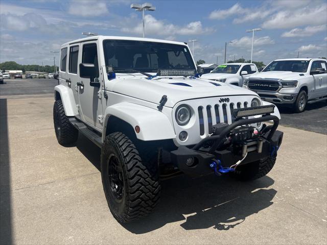 used 2013 Jeep Wrangler Unlimited car, priced at $17,487