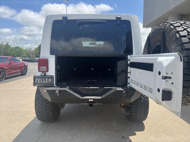 used 2013 Jeep Wrangler Unlimited car, priced at $17,487