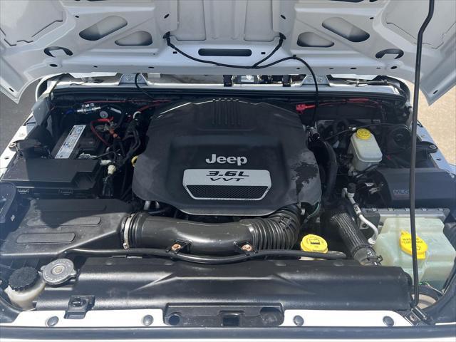 used 2013 Jeep Wrangler Unlimited car, priced at $17,487