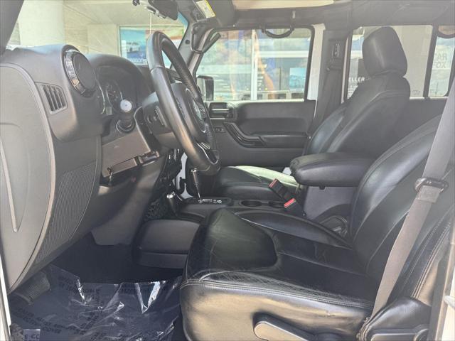 used 2015 Jeep Wrangler Unlimited car, priced at $21,487