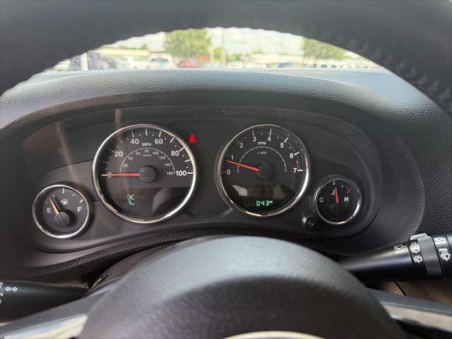 used 2015 Jeep Wrangler Unlimited car, priced at $21,487