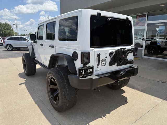 used 2015 Jeep Wrangler Unlimited car, priced at $21,487