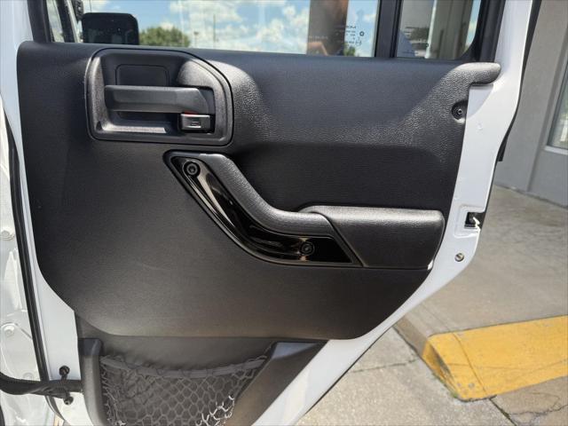 used 2015 Jeep Wrangler Unlimited car, priced at $21,487