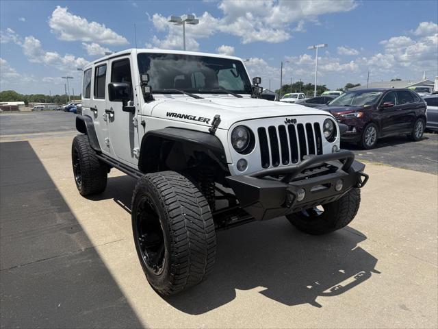 used 2015 Jeep Wrangler Unlimited car, priced at $21,487