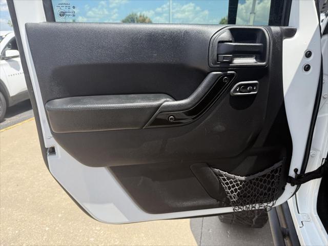 used 2015 Jeep Wrangler Unlimited car, priced at $21,487