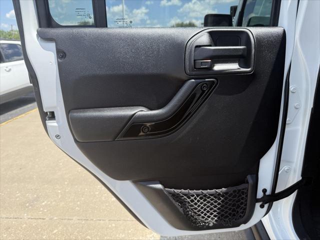 used 2015 Jeep Wrangler Unlimited car, priced at $21,487