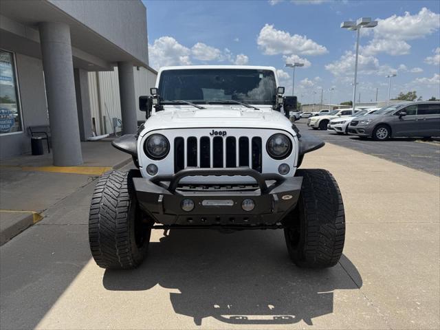 used 2015 Jeep Wrangler Unlimited car, priced at $21,487
