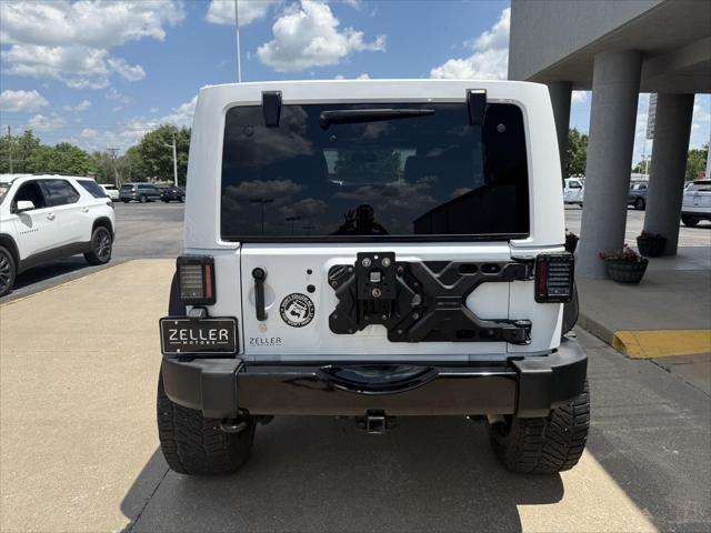 used 2015 Jeep Wrangler Unlimited car, priced at $21,487