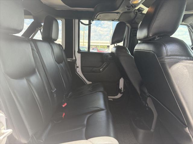 used 2015 Jeep Wrangler Unlimited car, priced at $21,487