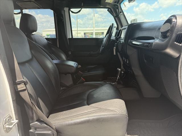 used 2015 Jeep Wrangler Unlimited car, priced at $21,487