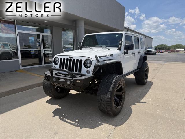 used 2015 Jeep Wrangler Unlimited car, priced at $21,487
