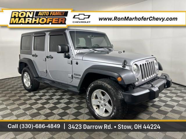 used 2014 Jeep Wrangler Unlimited car, priced at $13,798