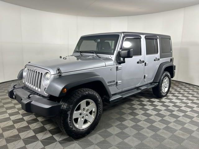 used 2014 Jeep Wrangler Unlimited car, priced at $13,798