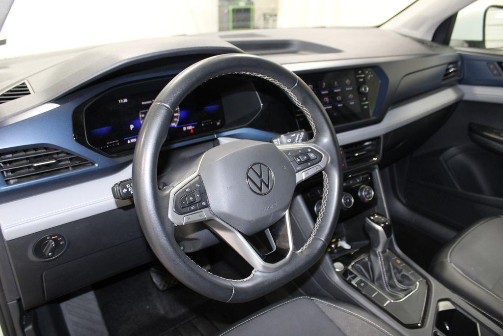 used 2023 Volkswagen Taos car, priced at $19,188
