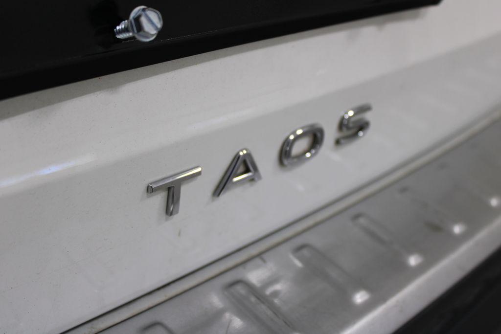 used 2023 Volkswagen Taos car, priced at $19,188