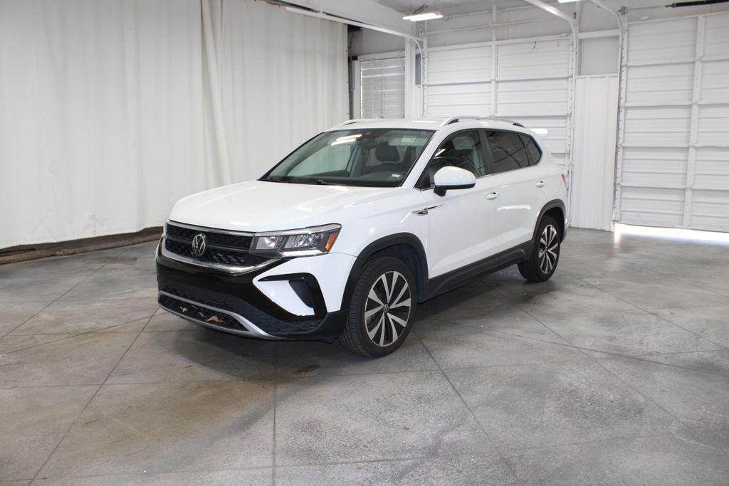 used 2023 Volkswagen Taos car, priced at $19,188