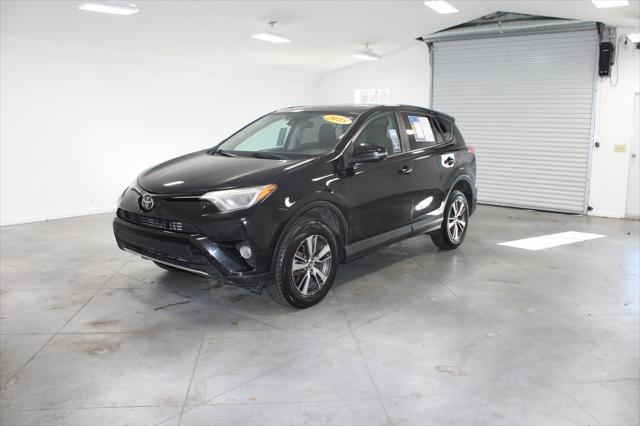 used 2018 Toyota RAV4 car, priced at $15,000