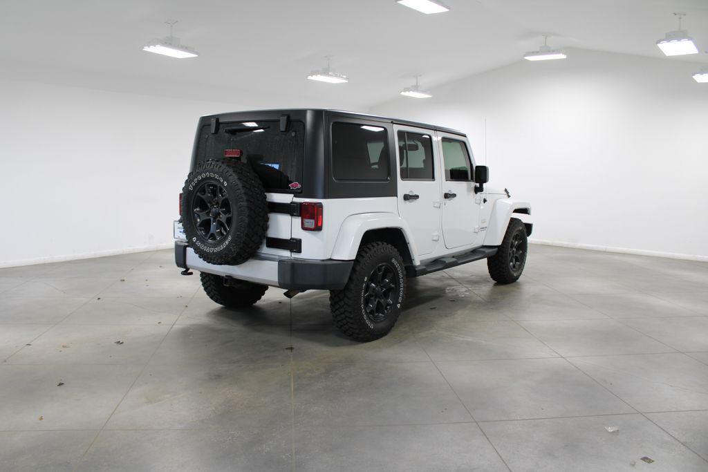 used 2015 Jeep Wrangler Unlimited car, priced at $17,398