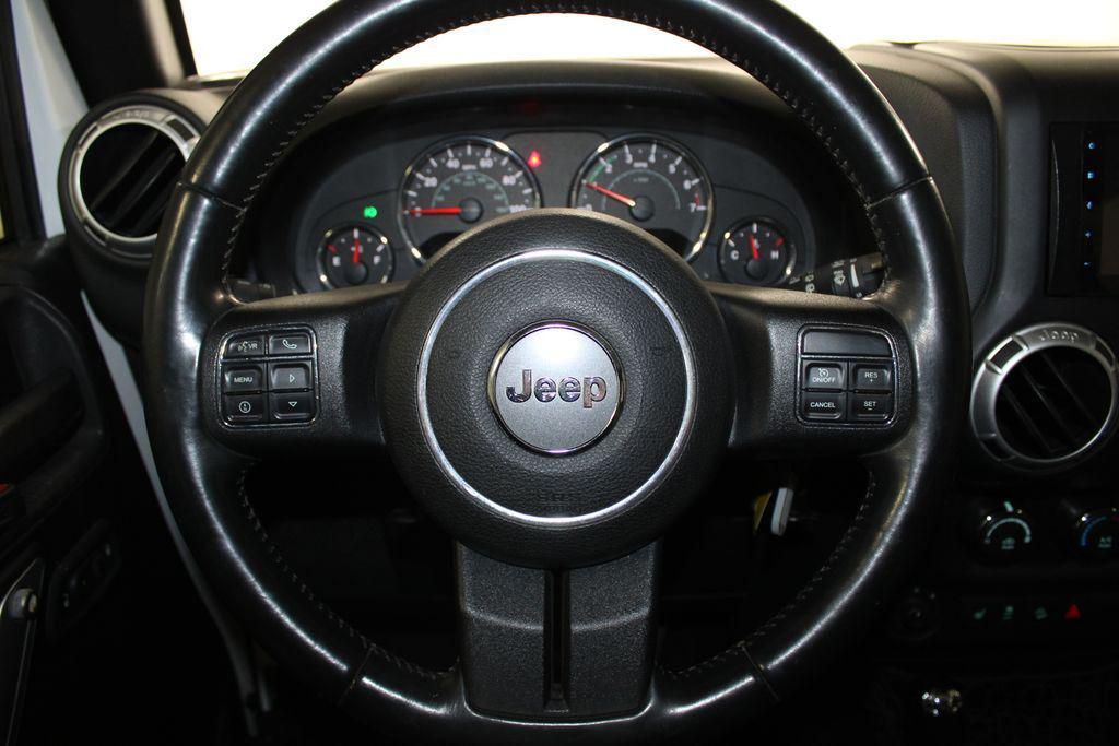used 2015 Jeep Wrangler Unlimited car, priced at $17,398