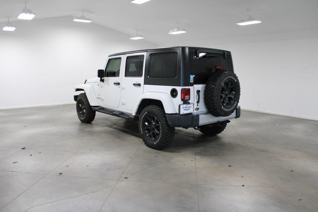used 2015 Jeep Wrangler Unlimited car, priced at $17,398