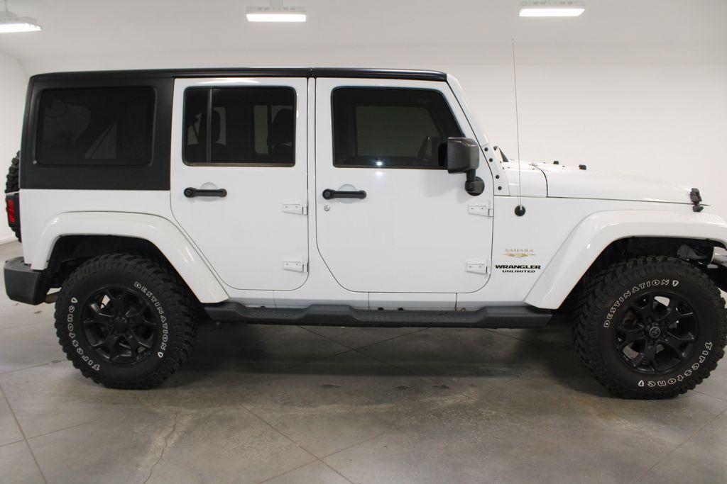 used 2015 Jeep Wrangler Unlimited car, priced at $17,398