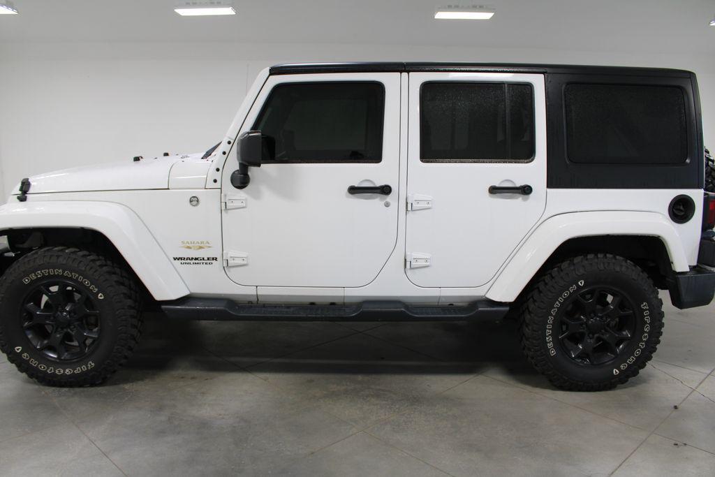 used 2015 Jeep Wrangler Unlimited car, priced at $17,398