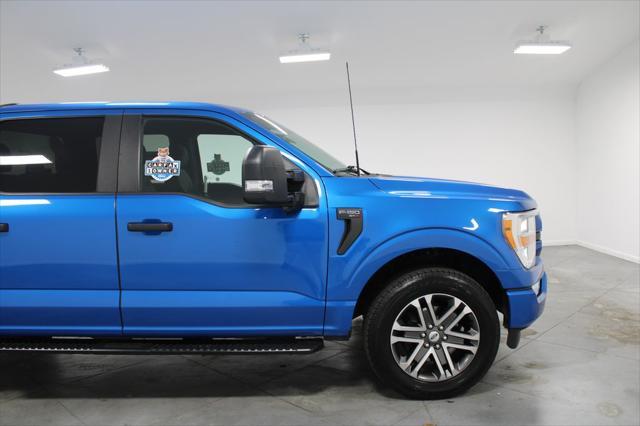 used 2021 Ford F-150 car, priced at $34,091